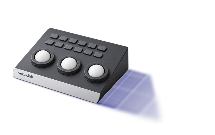 Colour-grading panel with three trackballs, vexo.club on its brushed white edge