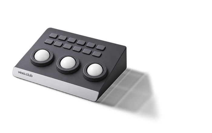 Colour-grading panel with three trackballs, vexo.club on its brushed white edge