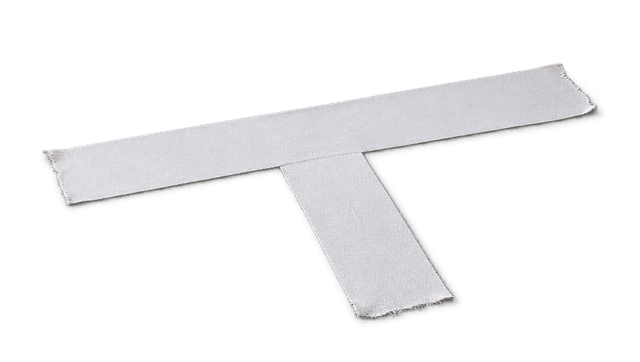 White gaffer-tape T on the floor, an actor’s mark