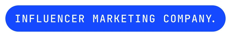 vexo.club label sticker reading “Influencer marketing company.”, paper on blue — influencer marketing agency in India.